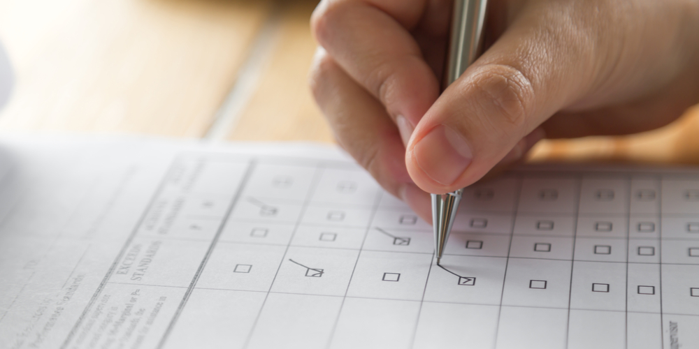 man filling out community association survey