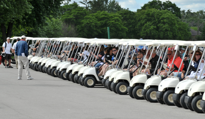 group of golf carts lined up