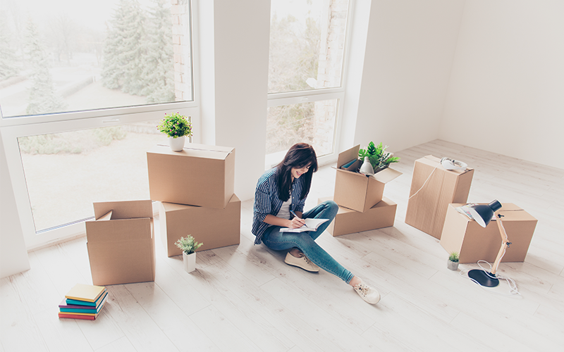 woman completing the condominium unit buyer's check list