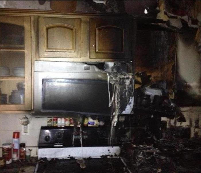 inside fire damaged kitchen before servpro evergreen chicago service