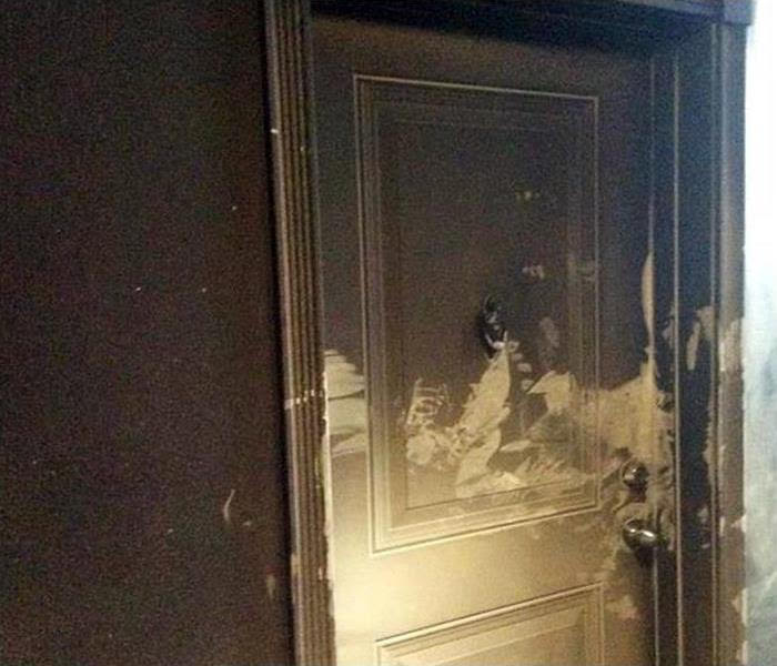fire damage to hallway before servpro evergreen chicago service