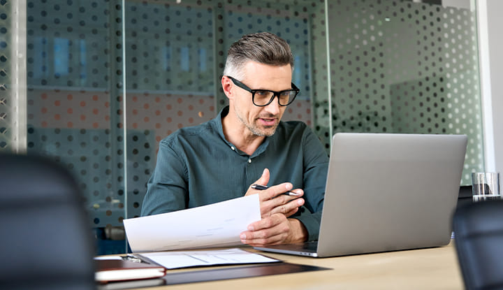 a man talking on a video conference call