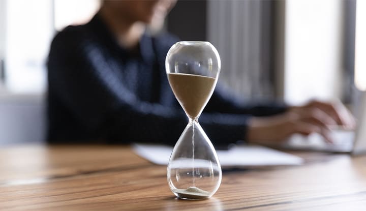 Close up view of an hourglass in an office
