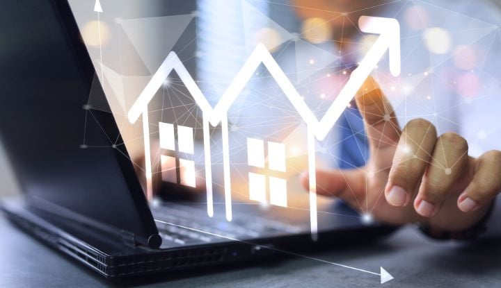 Housing concept near a laptop