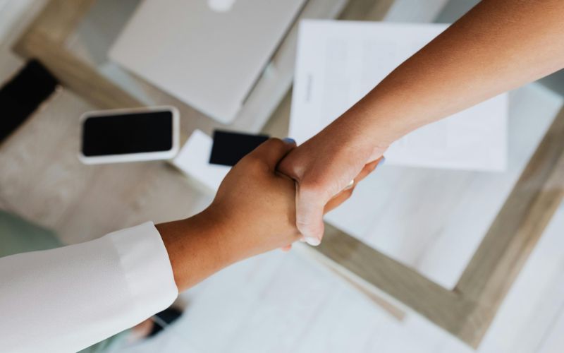 Two people shaking hands