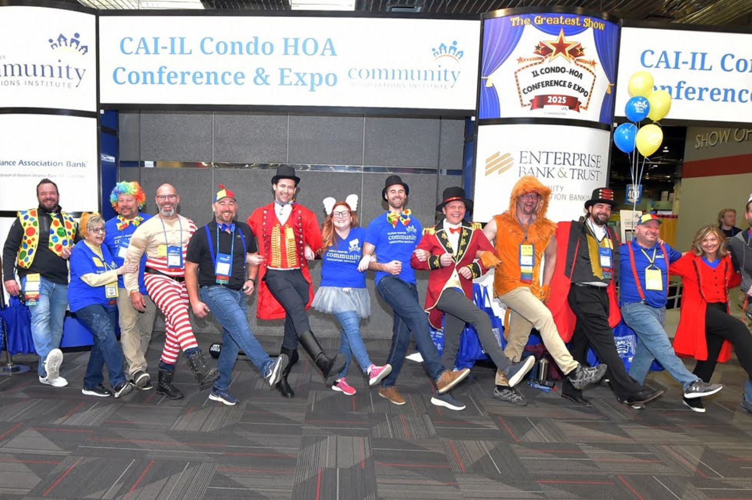 team smiling for portrait at conference expo